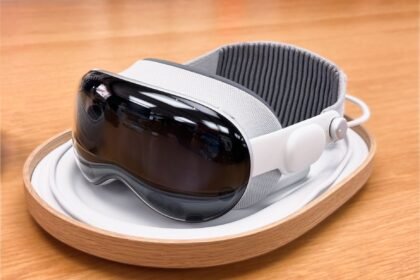 A sleek and modern virtual reality headset on a wooden surface.