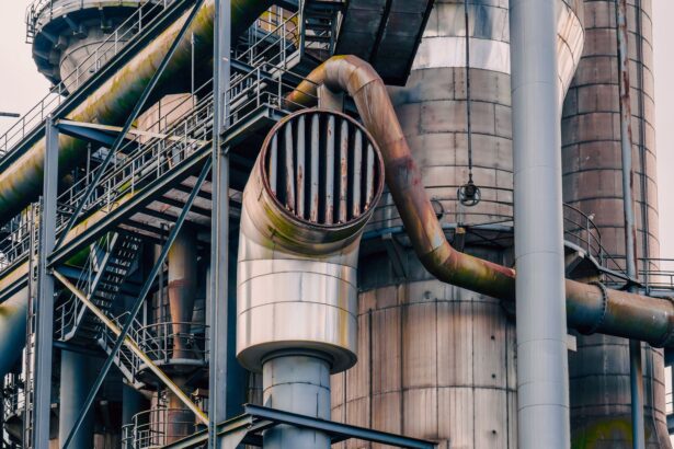 Close-up view of rusted industrial plant pipes and structures showcasing engineering marvels.