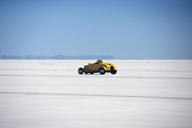 Vintage yellow hot rod racing on the Bonneville Salt Flats. High speed adventure.