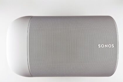 Top view of a sleek wireless speaker with a minimalistic design.