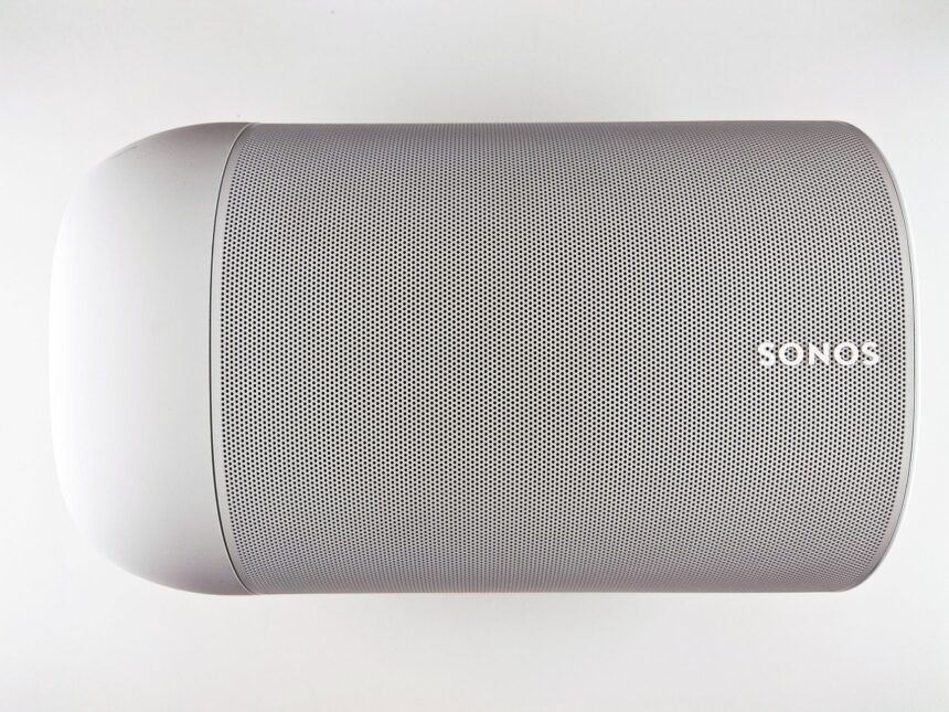 Top view of a sleek wireless speaker with a minimalistic design.