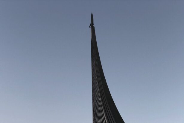 Monument to the Conquerors of Space in Moscow, captured from a low angle showing its sleek architecture against the sky.
