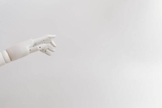 Minimalist image of a robotic hand reaching out on a white background.