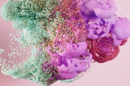Dynamic abstract composition of colorful particles and shapes, blending vivid textures and hues.