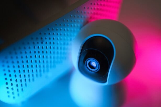 Close-up of a surveillance camera with neon lighting, symbolizing modern home security technology.
