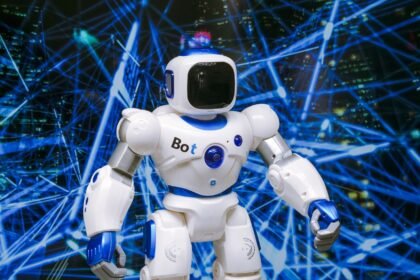 Advanced humanoid robot with glowing blue accents in a digital network setting.