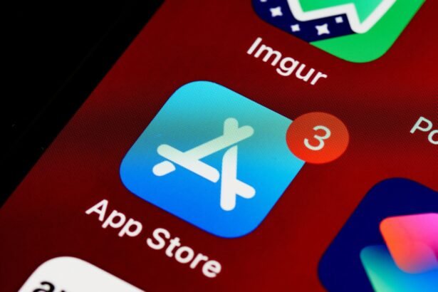 Close-up of App Store icon on iPhone screen with notification badge, highlighting app updates.