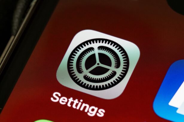 Detailed view of the iPhone screen showing the settings app icon.