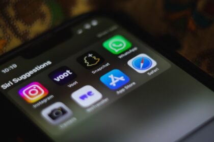 Detailed view of a smartphone home screen displaying various social media and utility apps.