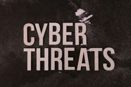 The phrase 'Cyber Threats' displayed on a textured dark background, emphasizing digital security.