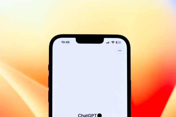 Close-up view of a smartphone showcasing the ChatGPT app against a colorful background.