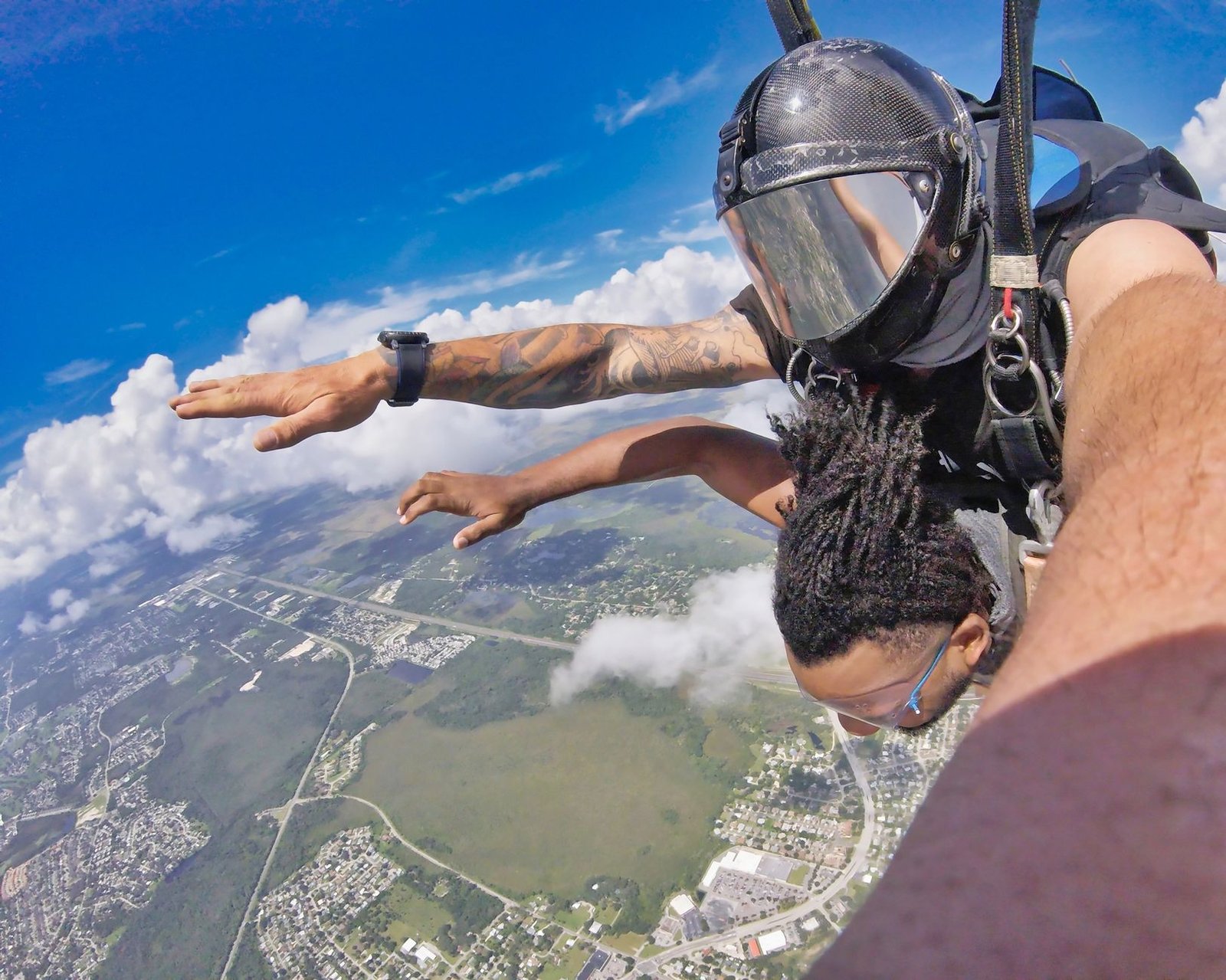 Dive into adventure with this thrilling tandem skydiving jump high above the earth.
