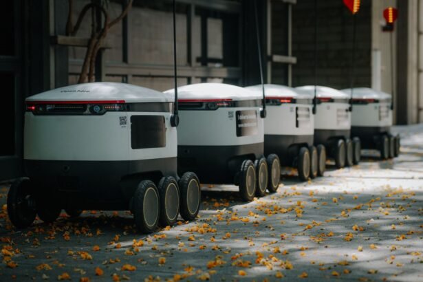 Futuristic delivery robots lined up outdoors, showcasing innovative modern technology.