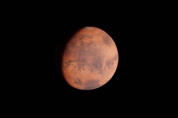 Detailed view of Mars showcasing its surface features against a dark sky backdrop.