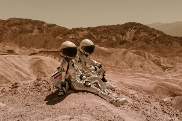 Two astronauts in silver suits sitting on a barren desert landscape, exploring new realms.