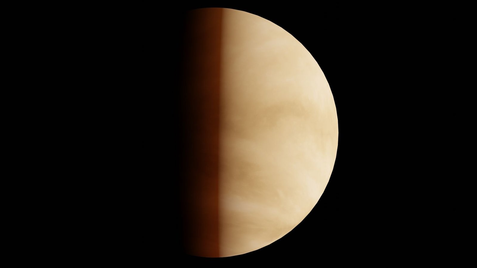 A striking image of Venus partially illuminated against a dark background, highlighting its atmospheric details.