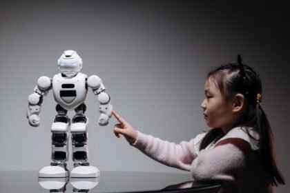 A young girl engaging with a robotic toy, highlighting curiosity and innovation.