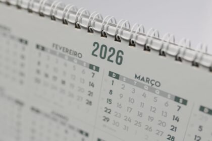 Close-up view of a 2026 spiral-bound desk calendar showing February and March.