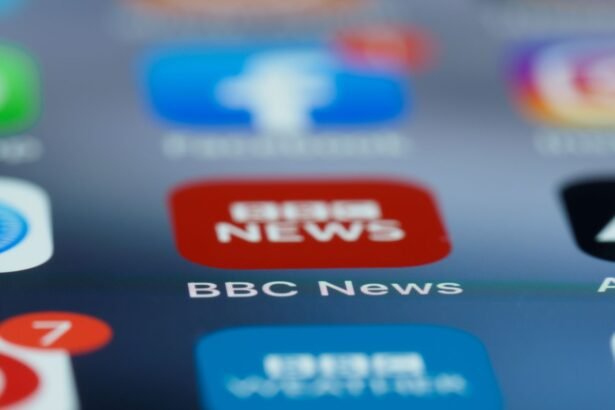 Macro shot of a smartphone screen displaying the BBC News app icon and notifications.