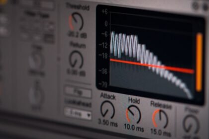 Close-up of audio editing software interface featuring waveform and controls.